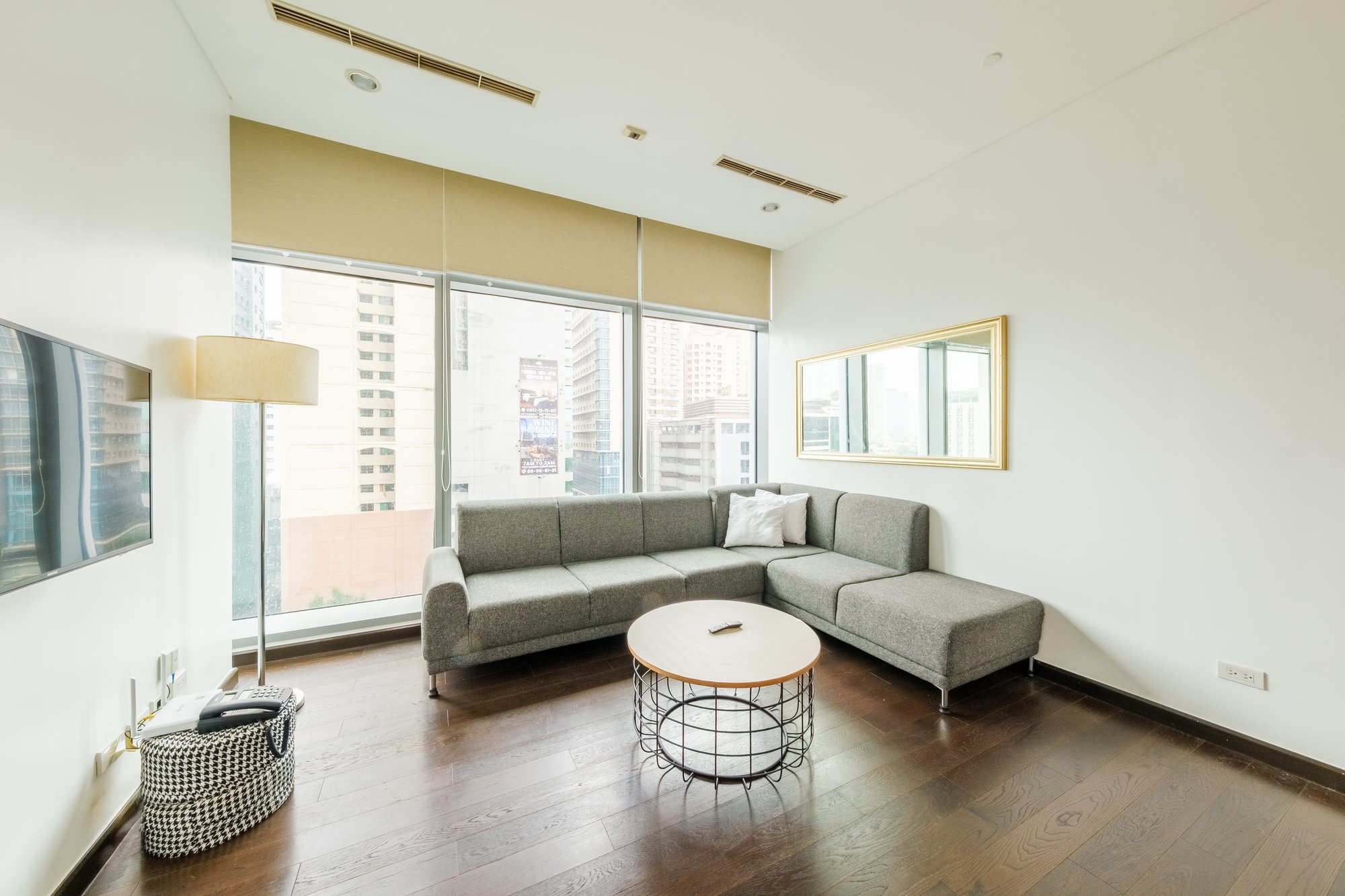 Furnished living room in a one-bedroom residence at Trump Tower, Makati